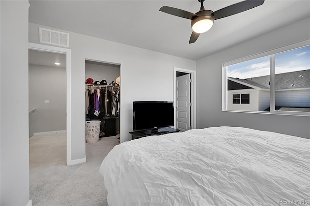 620 Apache Trl Unit A1, Ault, CO 80610 - carpeted bedroom with a closet, ceiling fan, and a walk in closet
