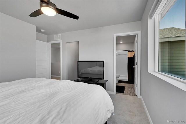 620 Apache Trl Unit A1, Ault, CO 80610 - carpeted bedroom with a ceiling fan and ensuite bath