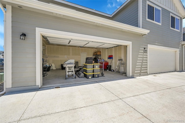 620 Apache Trl Unit A1, Ault, CO 80610 - garage with concrete driveway