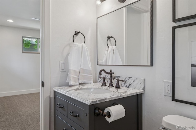 4634 W Tufts Cir, Denver, CO 80236 - bathroom with vanity and toilet