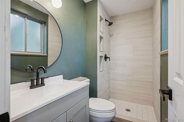 4634 W Tufts Cir, Denver, CO 80236 - full bathroom with tiled shower and vanity