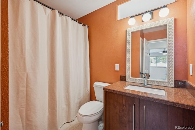 4634 W Tufts Cir, Denver, CO 80236 - full bath featuring a textured wall, vanity, and a shower with shower curtain