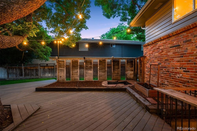 4634 W Tufts Cir, Denver, CO 80236 - view of deck at dusk