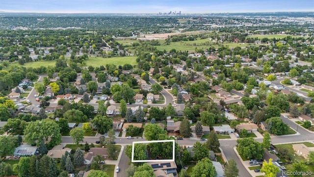 4634 W Tufts Cir, Denver, CO 80236 - aerial perspective of suburban area featuring property boundaries highlighted