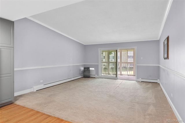 empty room featuring a baseboard radiator, ornamental molding, and light wood-type flooring