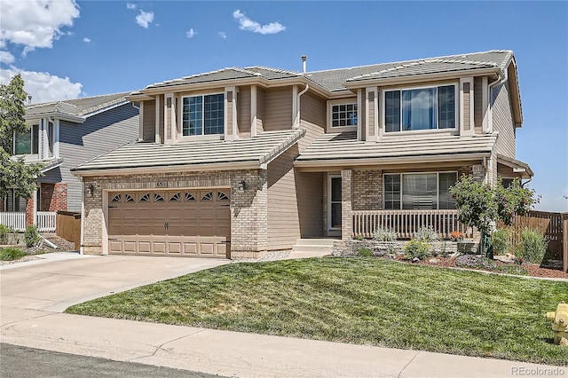 view of front of property featuring concrete driveway, a tile roof, brick siding, and fence