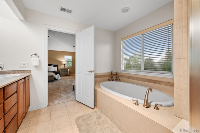 18967 W 54th Ln, Golden, CO 80403 - bathroom with ensuite bath, a garden tub, plenty of natural light, and vanity