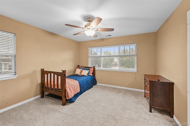 18967 W 54th Ln, Golden, CO 80403 - carpeted bedroom with baseboards and ceiling fan