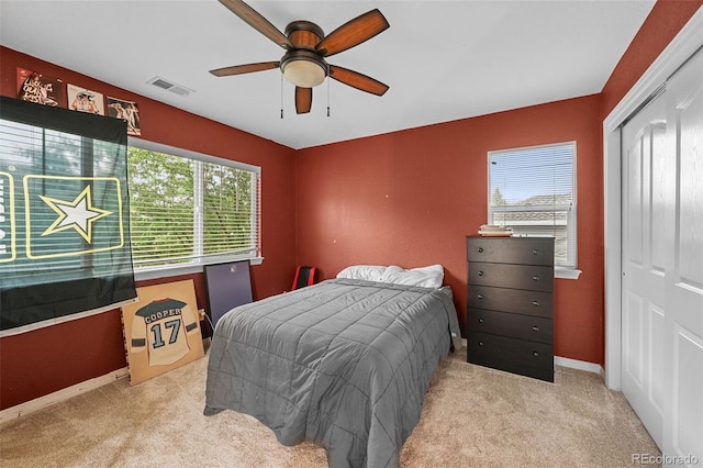 18967 W 54th Ln, Golden, CO 80403 - bedroom featuring carpet floors, baseboards, a closet, and ceiling fan