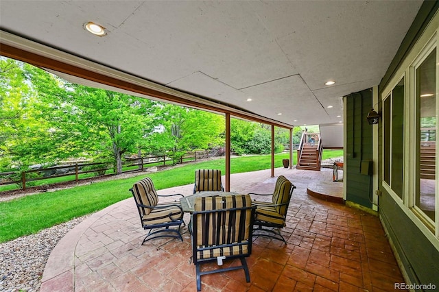 18967 W 54th Ln, Golden, CO 80403 - view of patio with stairs and outdoor dining space