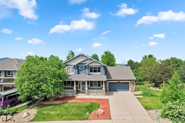 18967 W 54th Ln, Golden, CO 80403 - craftsman inspired home featuring a porch, a garage, concrete driveway, a front yard, and roof with shingles