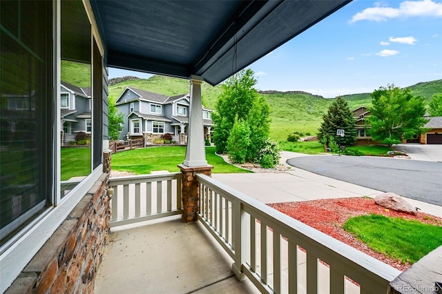 18967 W 54th Ln, Golden, CO 80403 - porch featuring a mountain view