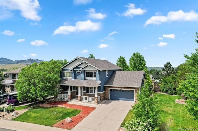 18967 W 54th Ln, Golden, CO 80403 - craftsman-style home featuring a porch, a garage, concrete driveway, a front yard, and stone siding