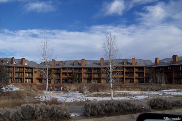 view of snow covered building