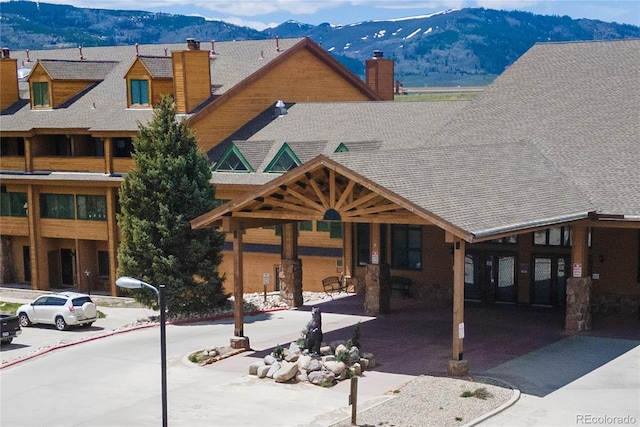 view of front of property with a mountain view