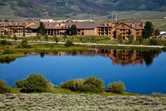 property view of water featuring a mountain view