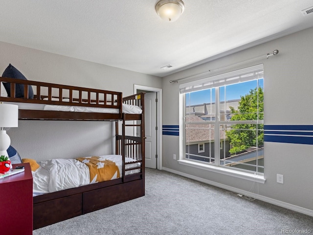5445 Verbena St, Denver, CO 80238 - bedroom with carpet floors and baseboards
