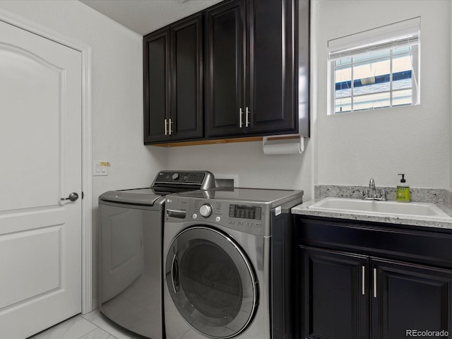 5445 Verbena St, Denver, CO 80238 - washroom featuring independent washer and dryer and cabinet space
