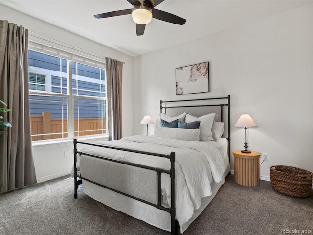 5445 Verbena St, Denver, CO 80238 - carpeted bedroom with baseboards and ceiling fan