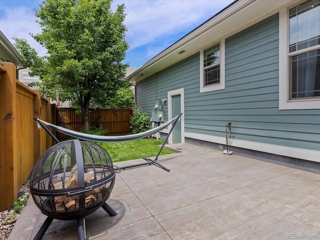5445 Verbena St, Denver, CO 80238 - view of patio featuring a fire pit
