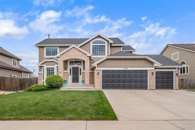 9548 La Quinta Dr, Lone Tree, CO 80124 - traditional home featuring brick siding, an attached garage, driveway, and roof with shingles