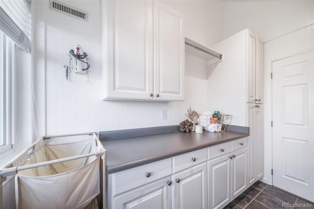 9548 La Quinta Dr, Lone Tree, CO 80124 - kitchen featuring dark countertops and white cabinetry