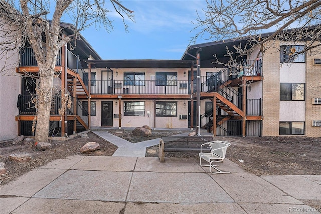 back of property with a patio area