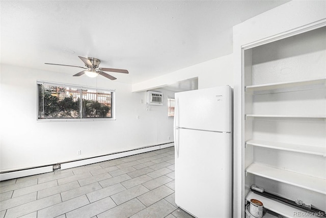 kitchen featuring baseboard heating, ceiling fan, a wall mounted air conditioner, and white fridge