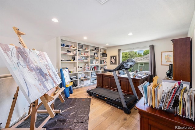 6500 W Mansfield Ave Unit 39, Denver, CO 80235 - workout room with light wood-type flooring and recessed lighting