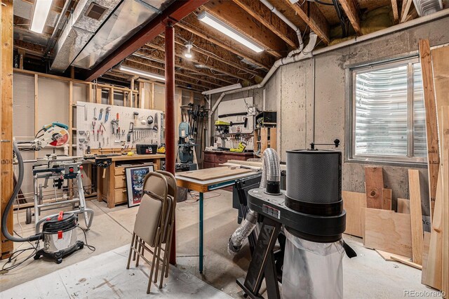 6500 W Mansfield Ave Unit 39, Denver, CO 80235 - basement with a workshop area