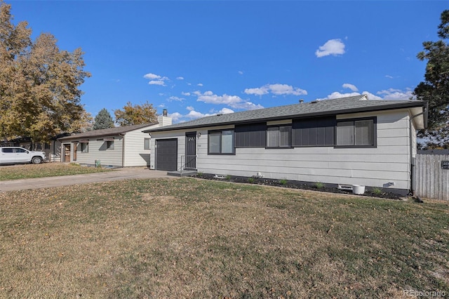 ranch-style home with a front lawn