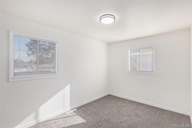 view of carpeted spare room