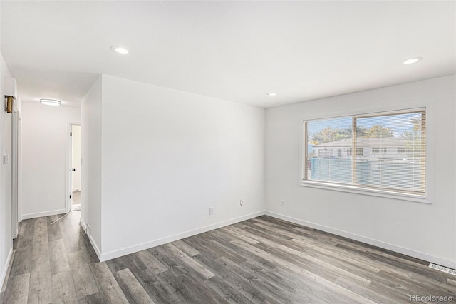 empty room featuring hardwood / wood-style floors