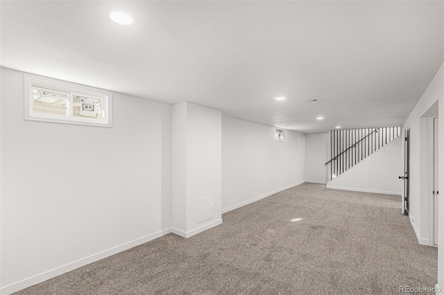 basement featuring carpet flooring