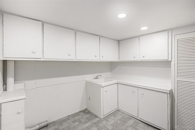 laundry area with sink