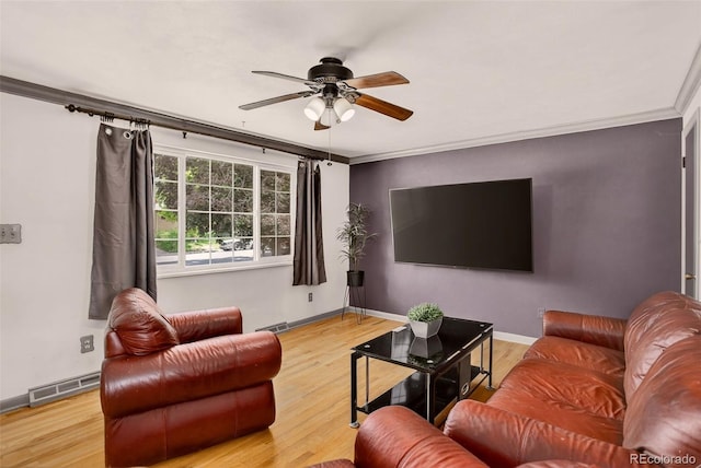609 S Quentin St, Aurora, CO 80012 - living area featuring ceiling fan, wood finished floors, and crown molding