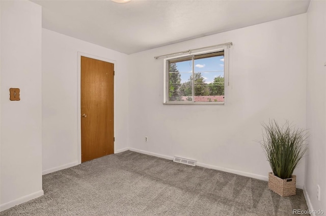 609 S Quentin St, Aurora, CO 80012 - carpeted empty room featuring baseboards