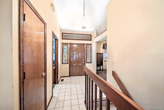 interior space featuring light tile patterned flooring