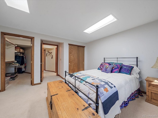 bedroom featuring light colored carpet