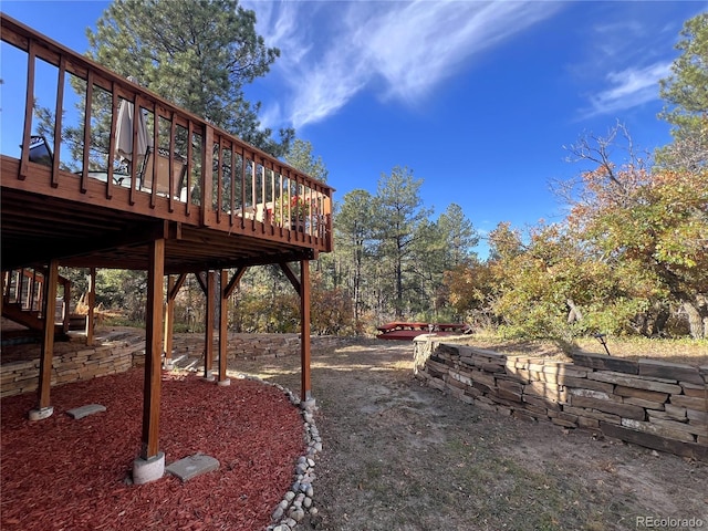 view of yard featuring a deck