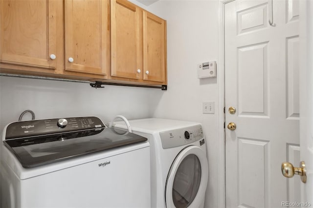 2336 Klein Pl, Colorado Springs, CO 80951 - washroom with washer and dryer and cabinet space