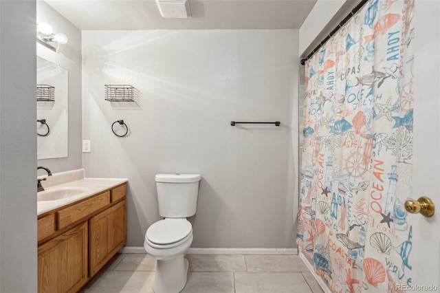 2336 Klein Pl, Colorado Springs, CO 80951 - bathroom with tile patterned flooring, toilet, vanity, a shower with curtain, and baseboards