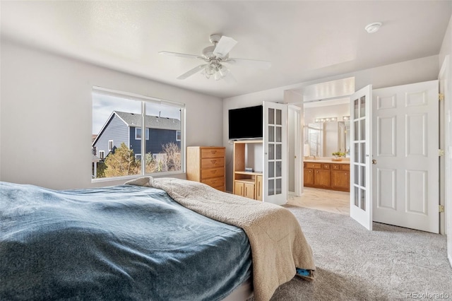 2336 Klein Pl, Colorado Springs, CO 80951 - bedroom featuring carpet, connected bathroom, ceiling fan, and french doors
