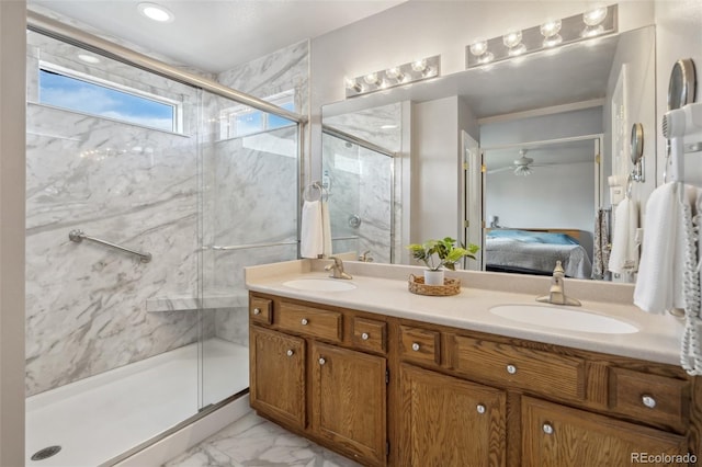 2336 Klein Pl, Colorado Springs, CO 80951 - full bath featuring connected bathroom, marble finish floor, a sink, and a marble finish shower