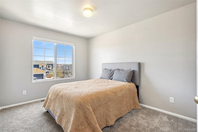 2336 Klein Pl, Colorado Springs, CO 80951 - bedroom with baseboards and carpet flooring