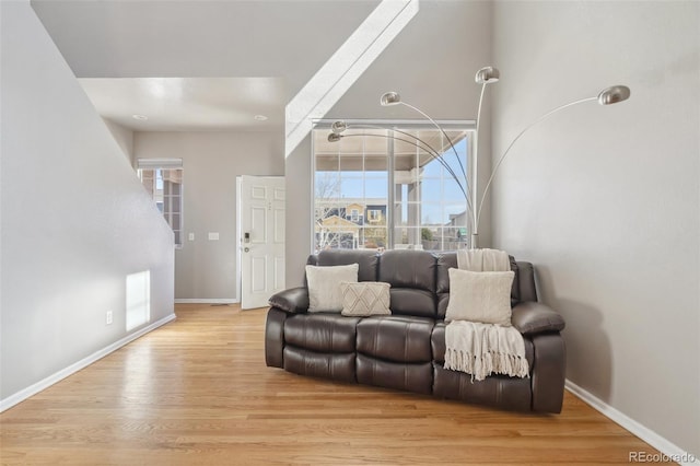 2336 Klein Pl, Colorado Springs, CO 80951 - living area featuring a wealth of natural light, wood finished floors, visible vents, and baseboards