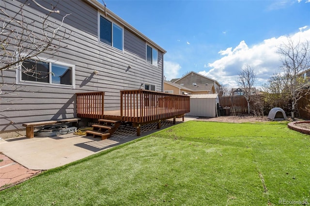 2336 Klein Pl, Colorado Springs, CO 80951 - view of yard with a storage unit, a fenced backyard, a patio area, a deck, and an outdoor structure
