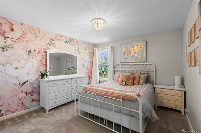 bedroom with carpet flooring, wallpapered walls, and baseboards