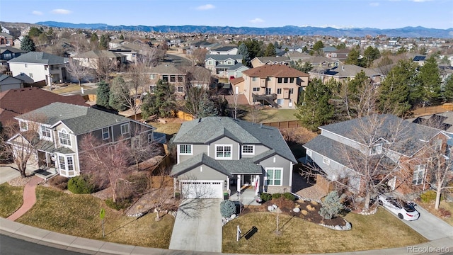 bird's eye view featuring a mountain view and a residential view