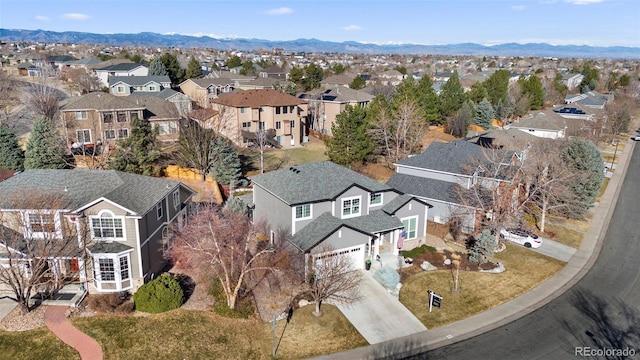 bird's eye view with a mountain view and a residential view